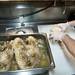 Holiday's Owner Rob TerBush sliced turkey on Monday. TerBush says they will cook 20 turkeys to be served on Thanksgiving. Daniel Brenner I AnnArbor.com